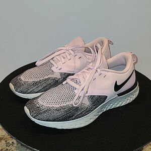 NIKE Odyssey React Flyknit Running Shoes pink and black Flyknit mesh. (#735=
